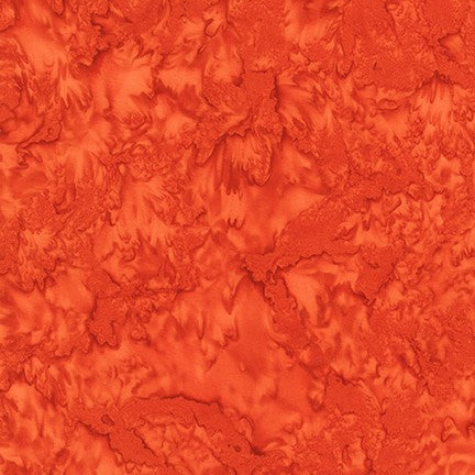 Prisma Dyes Batik in Orange Spice quilting fabric by Robert Kaufman